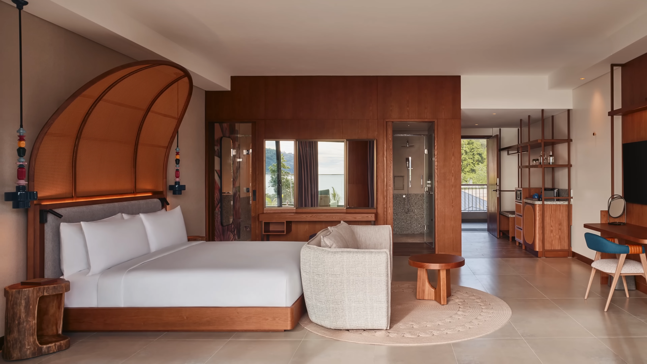 Elegant luxury bed setup in a tropical beachfront resort in Seychelles, offering stunning views and serene island ambiance_African Summer Safaris_Mtembezi Safaris