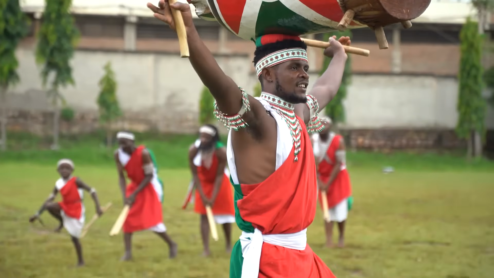 Burundi cultural dancers performing traditional music and dance in colorful attire, showcasing the country’s rich heritage and vibrant traditions_Mtembezi African Safaris