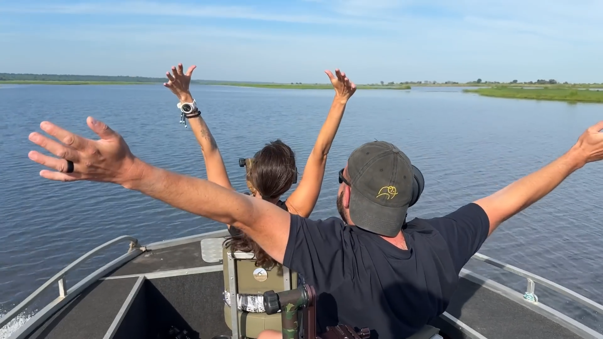 Photographers on a boat along the Chobe River taking wildlife photos_Botswana Chobe River Photography_Mtembezi African Safaris