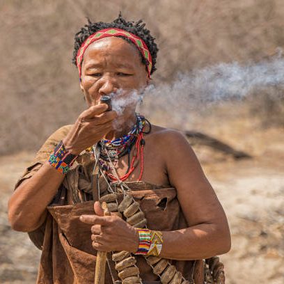 San woman wearing traditional clothing in Makgadikgadi, Botswana_Mtembezi African Safaris San woman wearing traditional clothing in Makgadikgadi, Botswana_Mtembezi African Safaris